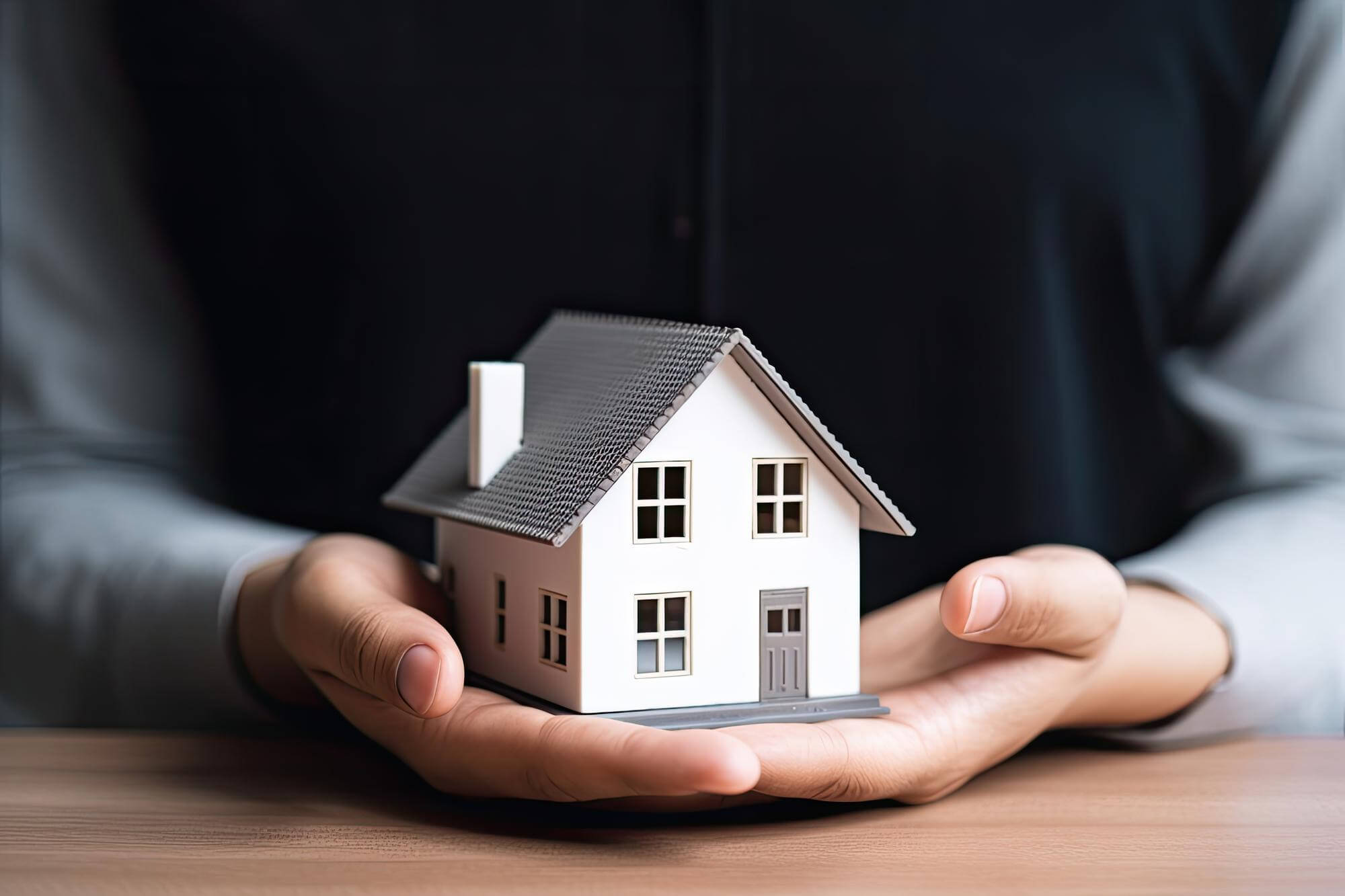 woman-showing-with-one-hand-mini-house-real-state-concept-ai-generative-1